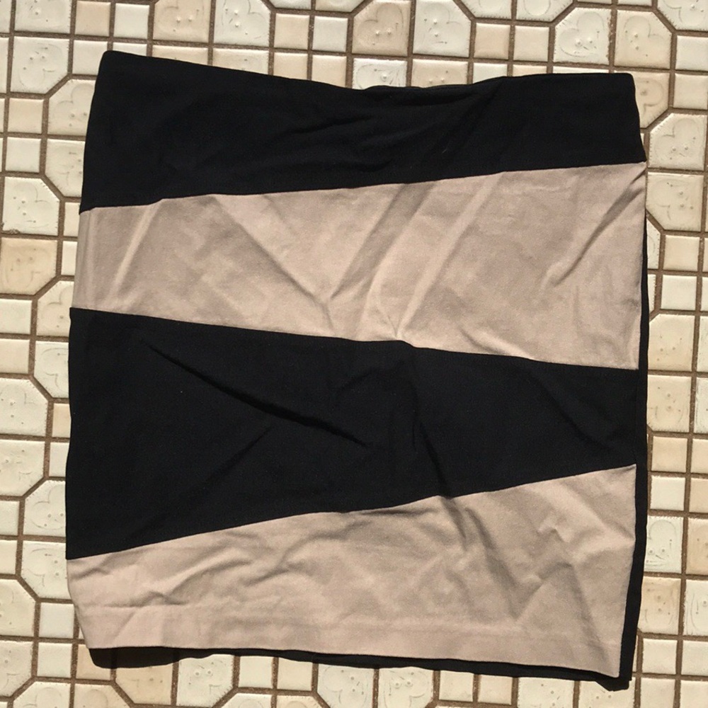 Black and cream flirtatious skirt. Size medium